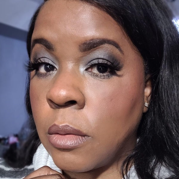 woman wearing premium lashes and liner