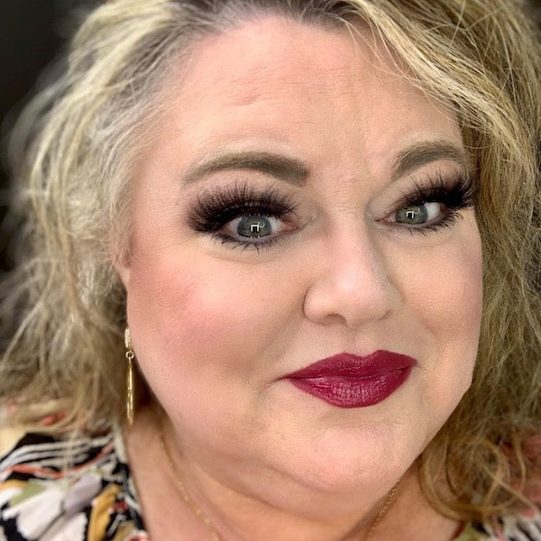 woman wearing premium lashes and liner